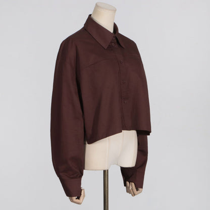 Minimalist style women's casual loose solid color long sleeved short shirt